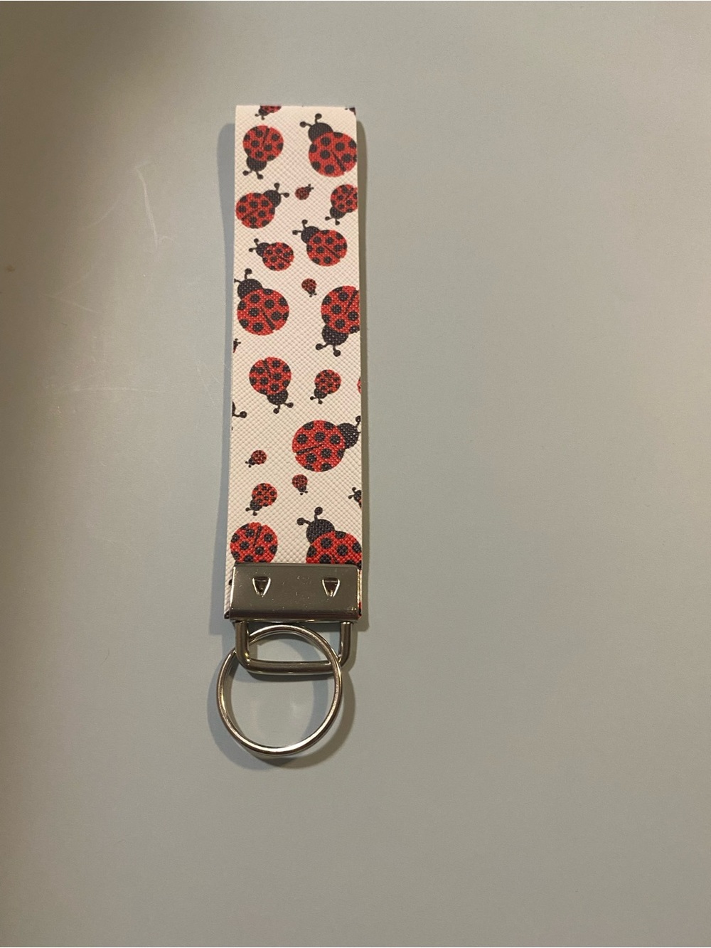 Source Unknown White Wristlet Key Fob with Red Ladybug Print